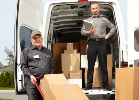 Man and van team preparing equipment safely
