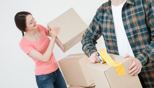 Unpacking services in Uxbridge helping arrange household items
