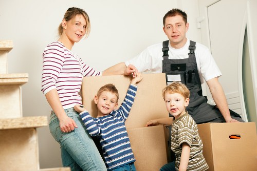 Residential removals team handling furniture in Uxbridge