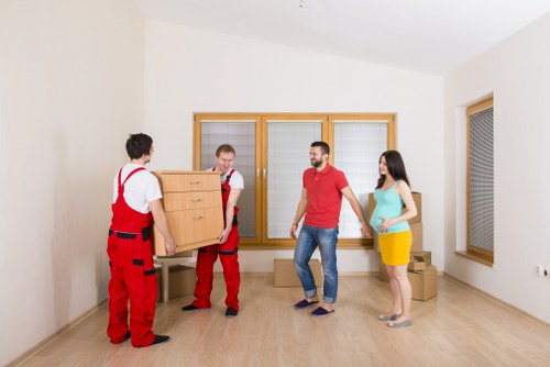 Professional team handling upright piano removals in Uxbridge