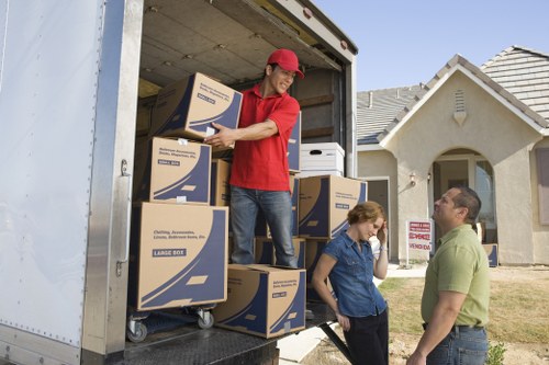 Uxbridge student removals team loading boxes for a local move