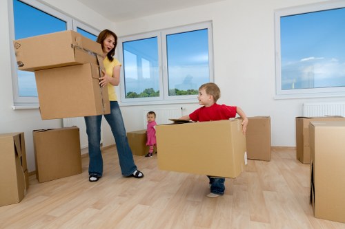 Uxbridge apartment relocation showing movers handling furniture through a stairwell