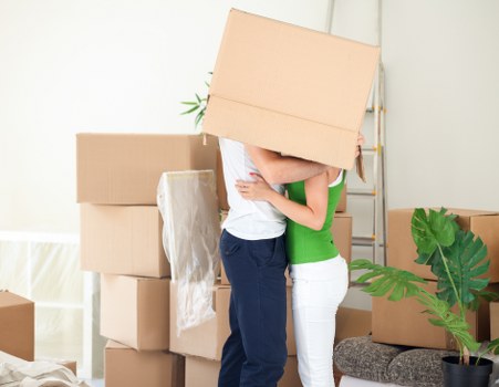 Flat removals team transporting household items securely in Uxbridge