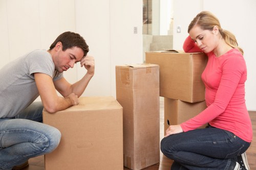 Professional removals team handling furniture during a house move in Uxbridge
